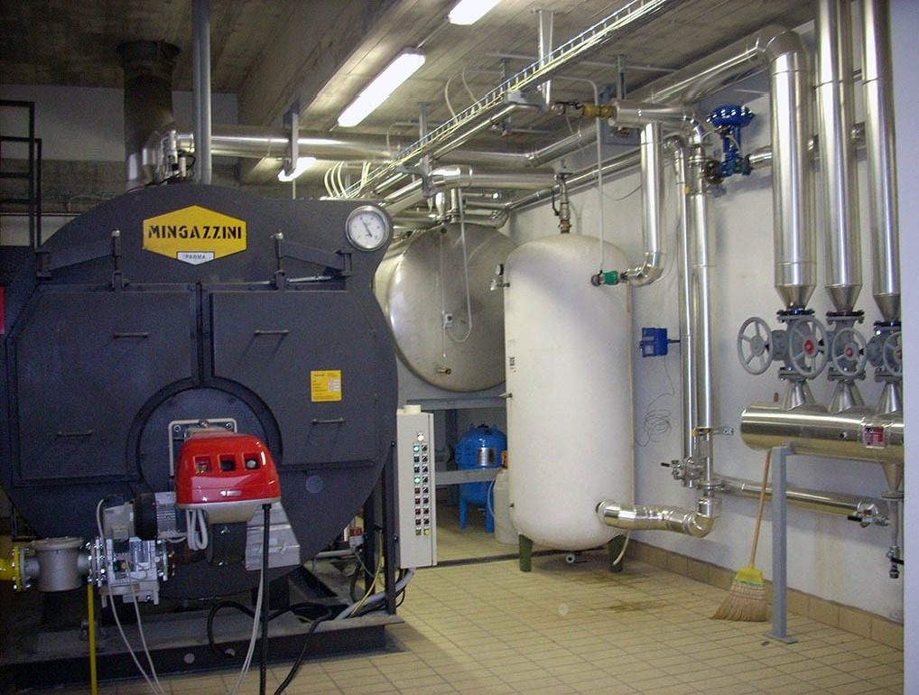 Steam boiler and cooling tower requiring conditioned water
