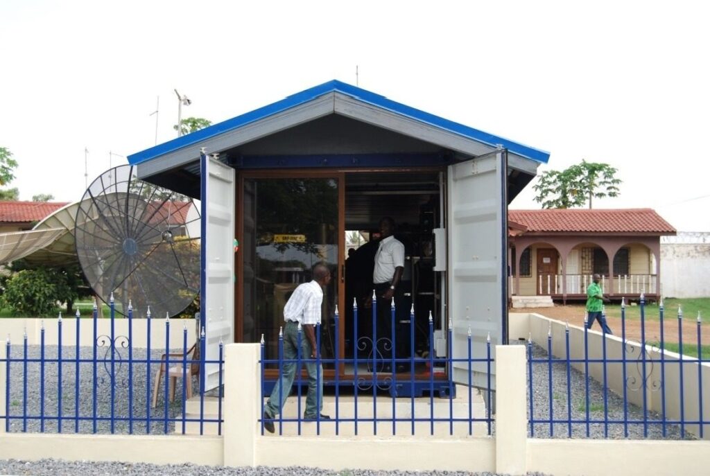 Containerised system with produced water storage